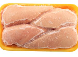 Frozen,Chicken,Meat,On,A,White,Background Frozen,Chicken,Meat,On,A,White,Background